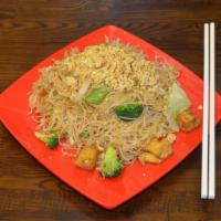 Pad Mie Thai Puck · Thin rice noodles with mixed vegetables stir fried in a light bean sauce topped with ground ...