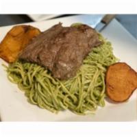Tallarines Verdes Con Bisteck · Linguine in Peruvian pesto sauce with steak.