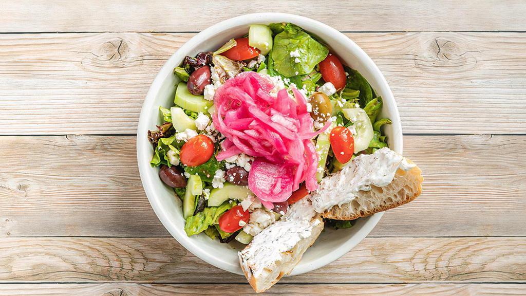 Greek Salad (Dinner) · Cherry tomatoes, cucumbers, marinated red onions, romaine, mixed greens, olives, feta & balsamic lemon dill vinaigrette with herbed goat cheese on a grilled baguette.
