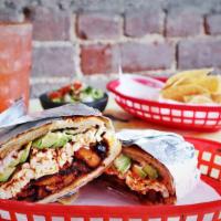 Cemitas · Sandwich from Puebla with chipotle sauce, black beans, Oaxaca cheese, avocado, tomatoes, and...