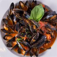 Mussels Marinara/ White Wine Sauce · Prince edward mussels in rich marinara or white wine garlic sauce served with bread.