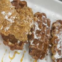 Chickee & Waffles · Southern fried chicken and Belgium waffles drizzled with maple syrup.