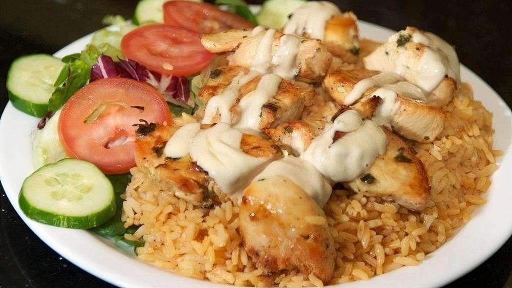Chicken Kebab Platter · Marinated boneless chicken breast chunks, charcoal grilled with lettuce, tomato and white sauce.