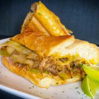 The Cuban · Griot(pork), ham, pickles, swiss, and mustard
