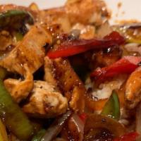 Sizzling Chicken  Fajitas   · Tri colored peppers, onions, guacamole, sour cream salsa, cheese, and flour tortillas. With ...