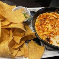 Buffalo Chicken Dip  · Tortilla Chips, Shredded Buffalo Chicken, Cheddar Cheese, Blue Cheese Crumbles, Topped with ...