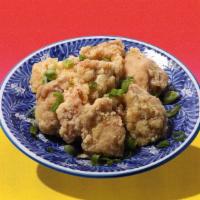 Tonkotsu · Pork bone stock soy sauce seasoned with chasu pork belly, wood ear mushrooms, cabbage, and g...