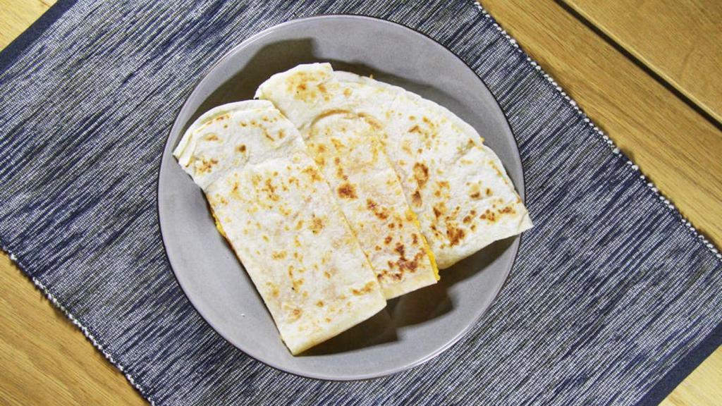 Quesadilla · Filled with sharp cheddar cheese and roasted red peppers. Served with sour and salsa.