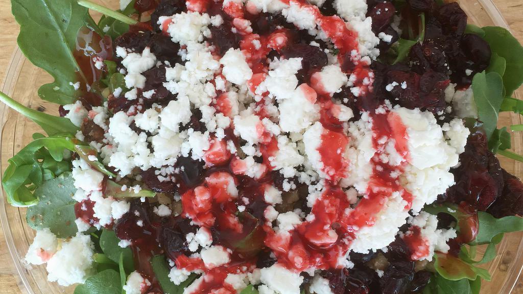 Stefanie’S Salad · Regular – fresh arugula, crushed walnuts, dried cranberries, feta with fat-free raspberry vinaigrette.