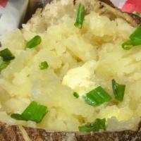 Plain Buttery Bakedpotato · A Classic Baked organic potato with butter, sour cream, Scallions.