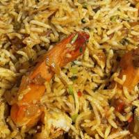 Shrimp Biryani · Basmati rice cooked flavored with saffron, nuts, special herbs spices shrimp.