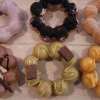 Donut (6 Pieces) · Half dozen donuts , whatever flavors you decide to choose!