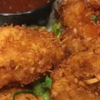Coconut Shrimp Basket · Golden Fried and with Sweet Chili Sauce