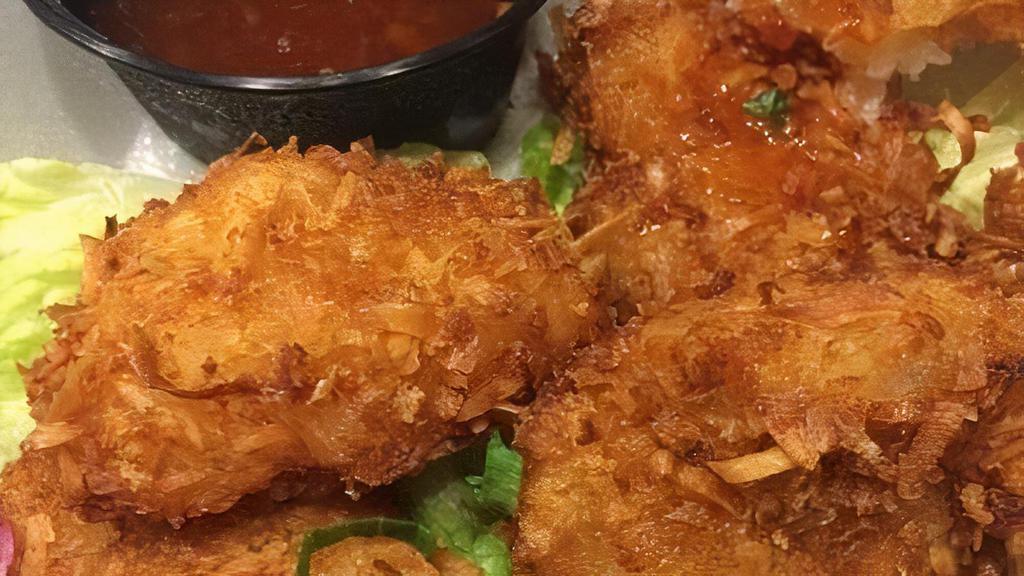 Coconut Shrimp Basket · Golden Fried and with Sweet Chili Sauce