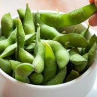 Edamame · Steamed green soy peas with sea salt.