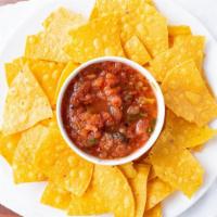 Chips And Salsa · Eight ounces salsa fresca and a large bag of chips.
