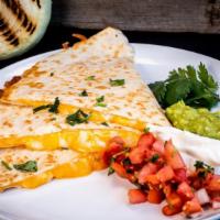 Quesadillas · Melted Jack and Cheddar cheese in a grilled flour tortilla with guacamole, pico de gallo, an...