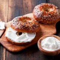 Cream Cheese Bagel · Freshly toasted bagel of your choice with classic cream cheese.