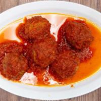 Side Of Meatballs With Tomato Sauce · Ground meat prepared with bread crumbs, minced onion, and italian seasoning.