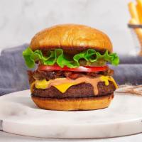 You'Re So Classic Burger · American beef patty topped with buttered lettuce, tomato, onion, and pickles. Served on a wa...