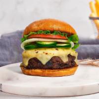 Jalapeno Abduction Burger · American beef patty cooked medium rare and topped with melted pepper jack cheese, jalapenos,...