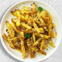 Truly Truffle Fries · (Vegetarian) Idaho potato fries cooked until golden brown and garnished with salt, truffle o...