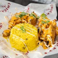 Chicken And Rice · Grilled Chicken Chopped up and sauced with your choice of sauce.