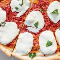 Margherita Pizza · Thin crust, fresh mozzarella, tomato sauce, and basil.