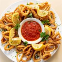 Fried Calamari · Fried squid (calamari) is quickly deep-fried, keeping it crunchy on the outside and simply p...
