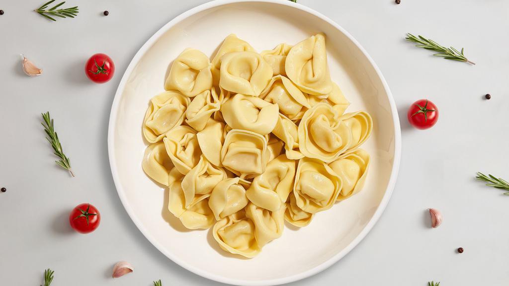 Your Tortellini  · Fresh gluten-free tortellini cooked with your choice of sauce and toppings!