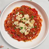 Sausage Lovin' Pasta (Spaghetti) · Fresh gluten-free spaghetti in a homemade rossa sauce topped with spicy Italian sausage, min...