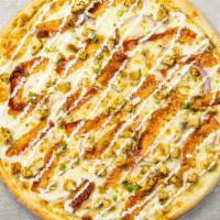 Sinful Alfredo Pizza · Alfredo sauce and bits of bacon hand-tossed gluten free dough.