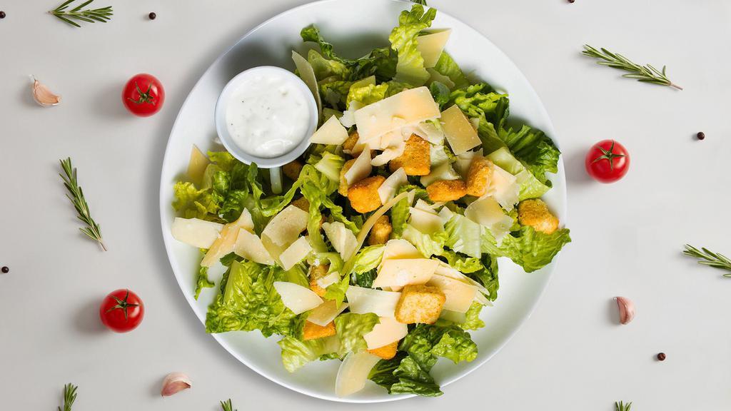 Caesar Salad · (Vegetarian) Romaine lettuce, house croutons, and parmesan cheese tossed with Caesar dressing.