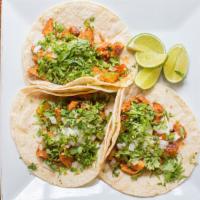 Pollo Taco · Grilled chicken. Over soft corn tortilla, topped with onions and cilantro or served with let...