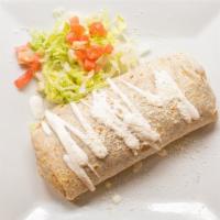 Pollo Burrito · Chicken. Flour tortillas filled with rice, beans, lettuce, pico de gallo topped with sour cr...