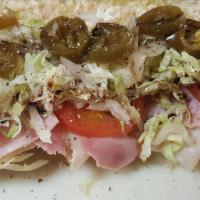 Ham Hoagie · Topped with lettuce tomatoes onions oil and vinegar salt pepper and oregano.