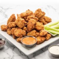 Boneless Wings (20-Pc Party Pack) · 20 boneless chicken wings tossed in your choice of sauce.