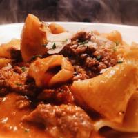 Rigatoni Bolognese · Represents a classic enjoyed by many for over 18 years. Traditional Italian meat sauce with ...
