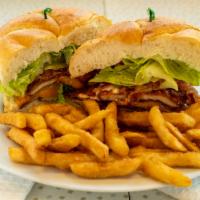 Norwalker Sandwich · Voted Town Favorite!! Chicken cutlet, lettuce, bacon, cheddar, hot sauce and ranch. Served o...