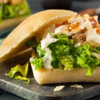 Chicken Caesar Sub Sandwich · Delicious 10 inch sub sandwich made with Chicken, lettuce, and cheese.