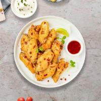 Sweet And Chili Of Mine Chicken Wings · Fresh chicken wings breaded, fried until golden brown, and tossed in sweet chili sauce. Serv...