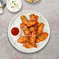 Sweet And Sour Collaboration Wings · Fresh chicken wings breaded, fried until golden brown, and tossed in sweet and sour sauce. S...