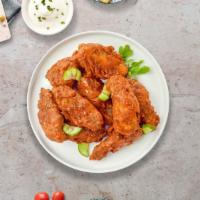 Hot In Nashville Wings · Fresh chicken wings breaded, fried until golden brown, and tossed in Nashville Hot Sauce. Se...