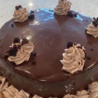 Chocolate Mousse Cake · A simple, moist, layered chocolate cake, filled with dark chocolate mousse, and then a warm ...