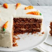 Carrot Cake · This Carrot Cake is moist and flavorful with grated carrots and is frosted with a delicious ...