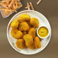 Cheeky Nuggets  · Bite sized nuggets of chicken breaded and fried until golden brown.