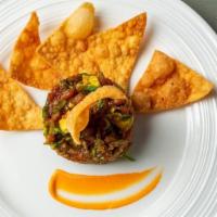 Tuna Tartare · Avocado, minced seaweed salad, scallion, masago, spicy sesame soy