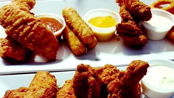 Appetizer Sampler · Buffalo wings, chicken fingers, mozzarella sticks and onion rings.