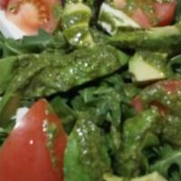 Avocado & Arugula Salad · Avocado, arugula, sun-dried tomato, cherry tomato and shaved Parmesan cheese. Tossed in our ...