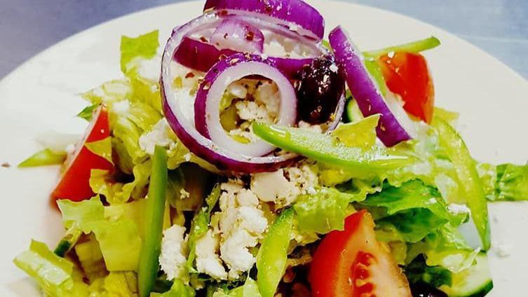 House Salad · Mixed greens, cucumber, vine tomatoes, olives, shredded carrot, bell peppers and red onions. Tossed in our special light Italian dressing.
